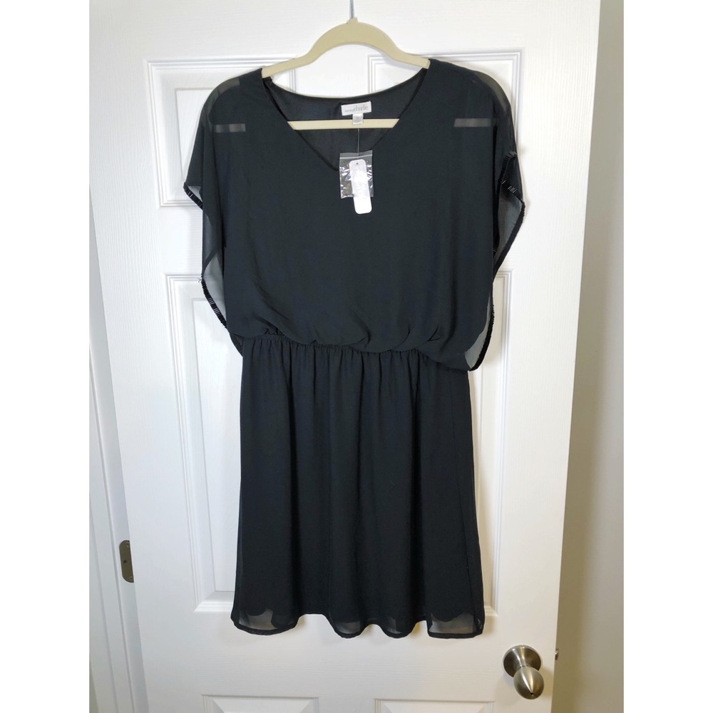 Black mini dress with beaded accents